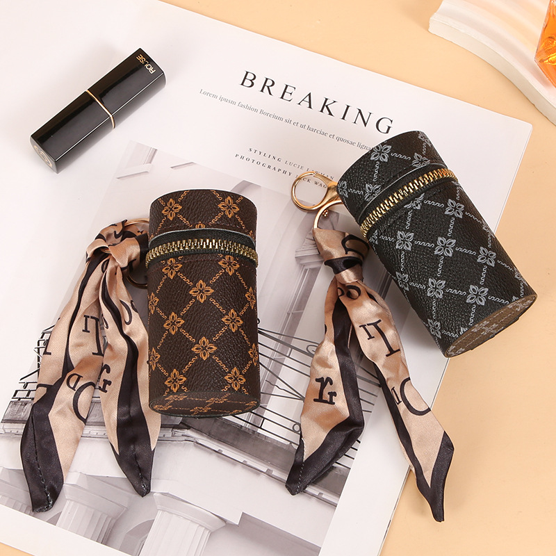 Sjaalpatroon lippenstift sleut - Monogram Keychain Leather recensie en prijs