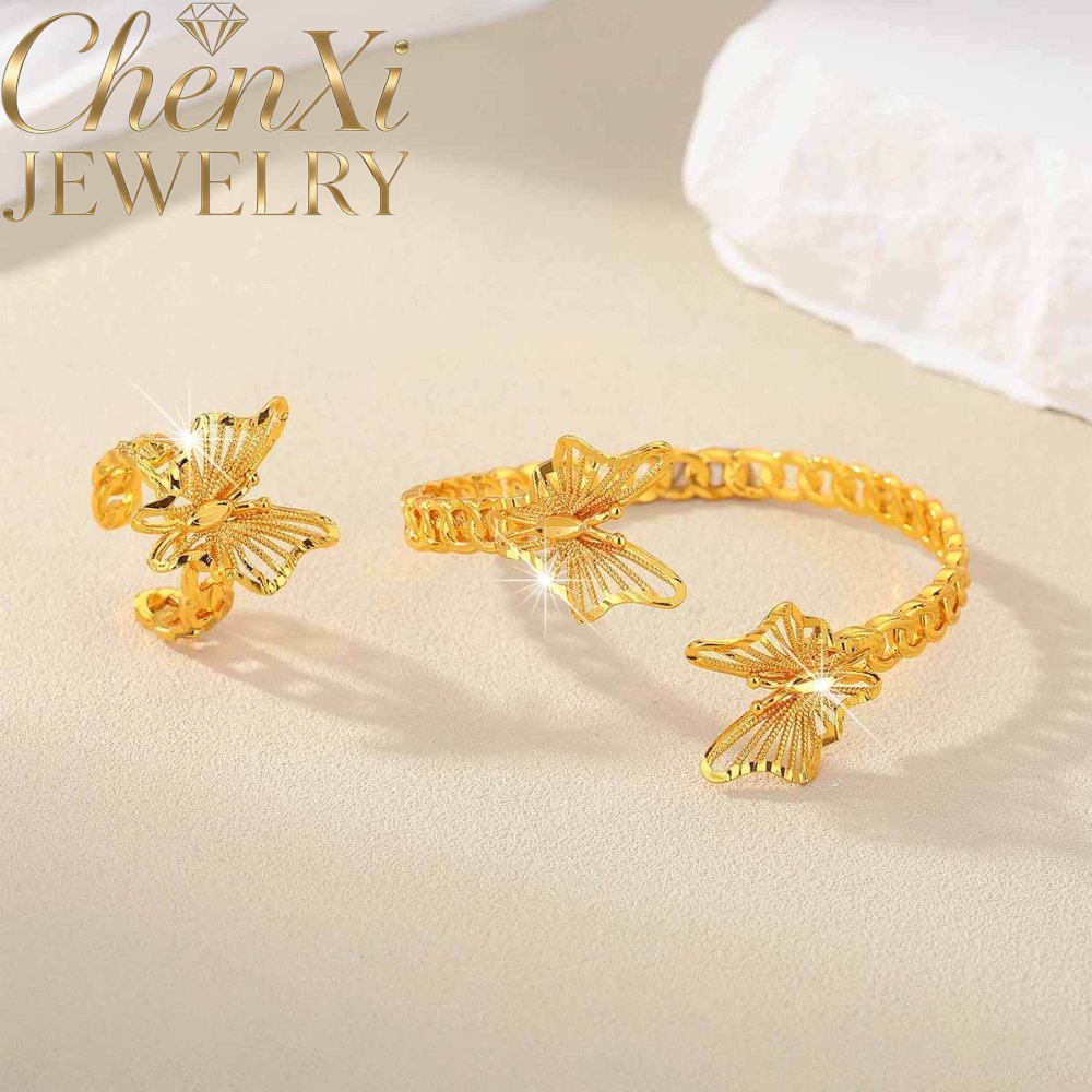 Zandgouden bloemmotief open ar - Coordinates Bracelet recensie en prijs